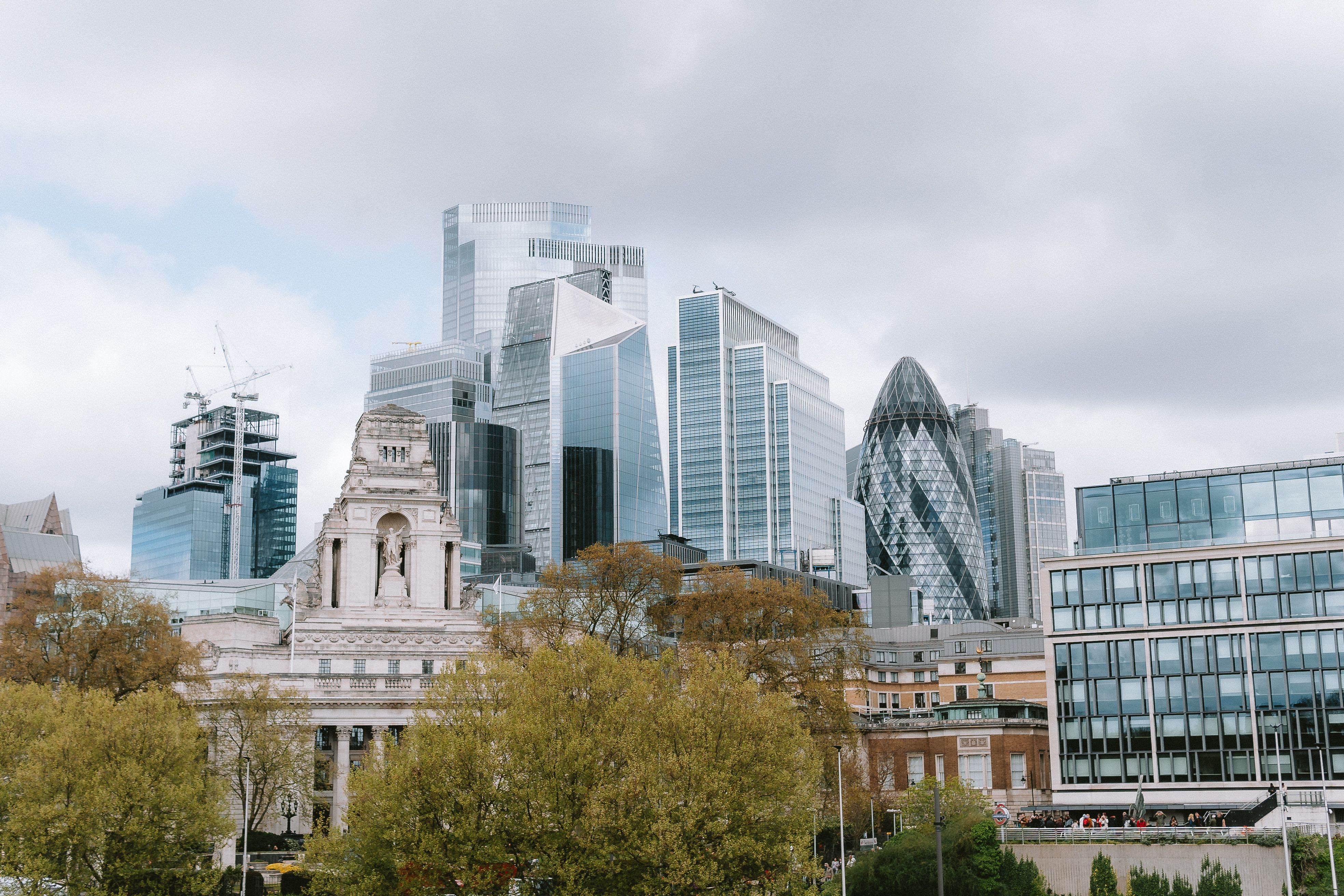 London cityscape where historic stone architecture meets modern glass towers